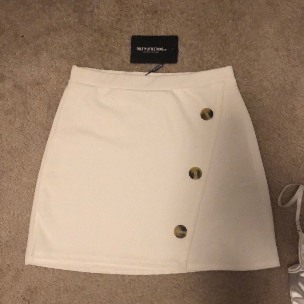 Pretty little thing cream mini skirt
